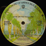 The Doobie Brothers - Livin' On The Fault Line LP levy (käytetty)